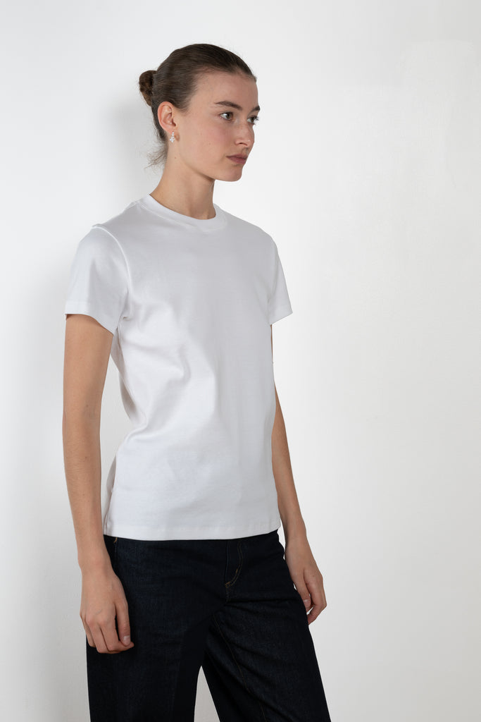 The Monica Tee by Flore Flore is a&nbsp;relaxed fit short-sleeved tee with a double stitched cut off seam on the back.