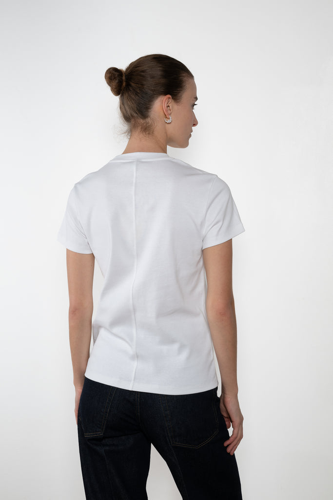 The Monica Tee by Flore Flore is a&nbsp;relaxed fit short-sleeved tee with a double stitched cut off seam on the back.