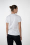 The Monica Tee by Flore Flore is a&nbsp;relaxed fit short-sleeved tee with a double stitched cut off seam on the back.