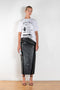 The Straight Skirt by GAUCHERE is a mid waist signature skirt with a back slit in this season's lightweight faux leather 