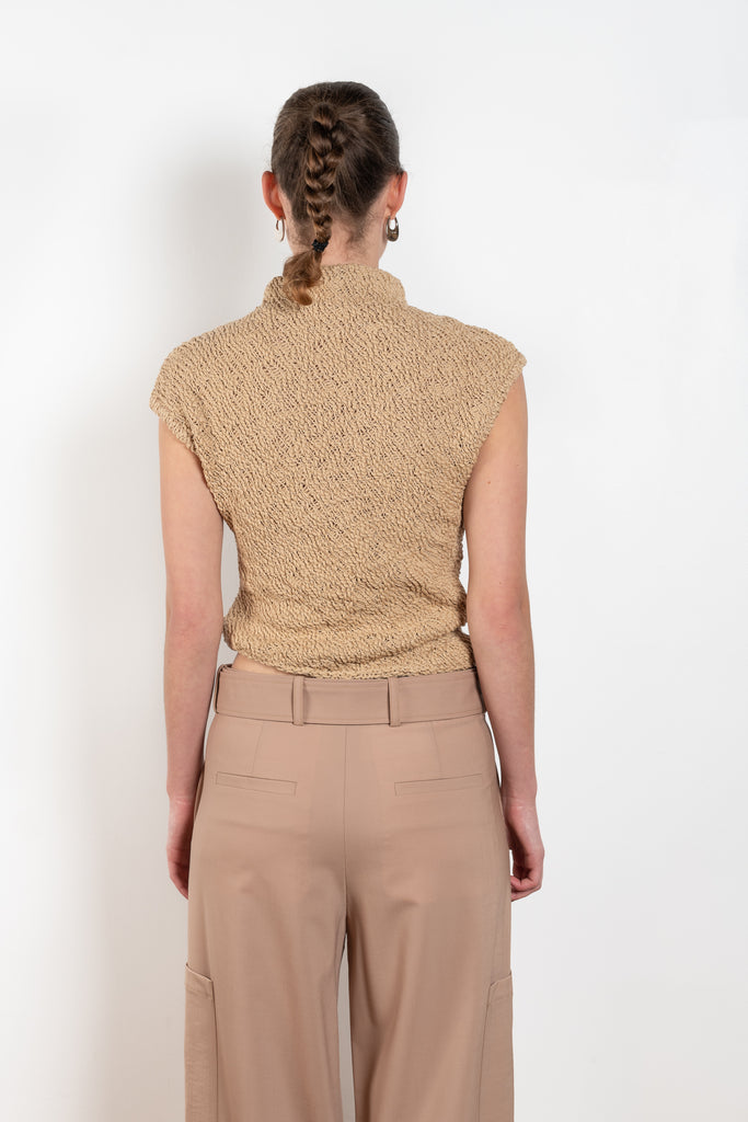 The Top 2772 by Gauchere is an assymetric top in a beige cotton knit