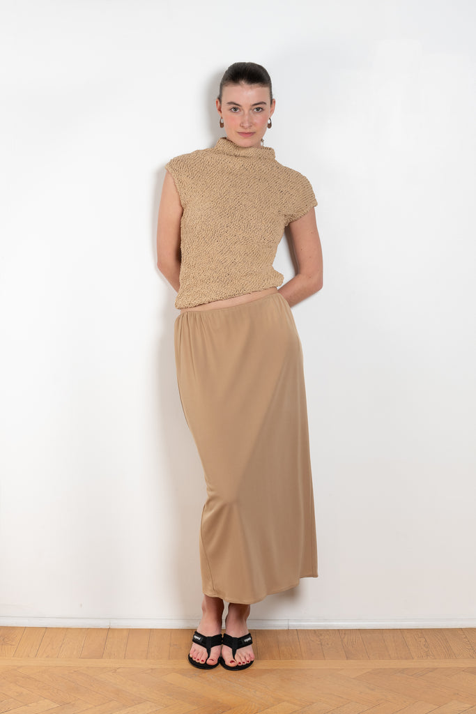 The Top 2772 by Gauchere is an assymetric top in a beige cotton knit