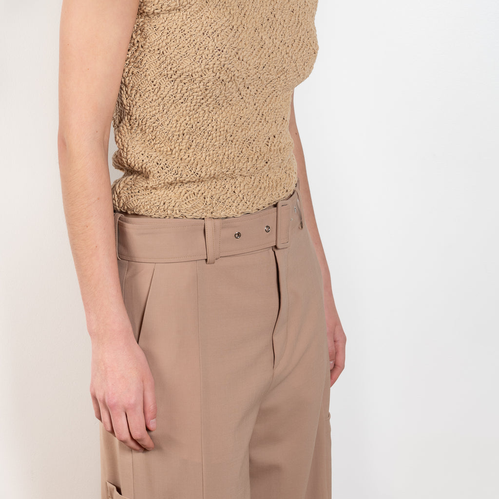 The Trouser M0351 by GAUCHERE is a mid waist suiting trouser with a wide leg and cargo detail