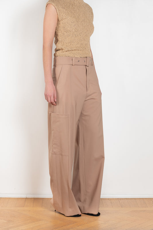 The Trouser M0351 by GAUCHERE is a mid waist suiting trouser with a wide leg and cargo detail