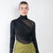 The Paita Midi Weave Skirt is a midi length wrap skirt with a zip closure in a linen blend