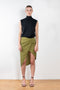 The Paita Midi Weave Skirt is a midi length wrap skirt with a zip closure in a linen blend