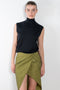The Paita Midi Weave Skirt is a midi length wrap skirt with a zip closure in a linen blend