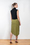 The Paita Midi Weave Skirt is a midi length wrap skirt with a zip closure in a linen blend