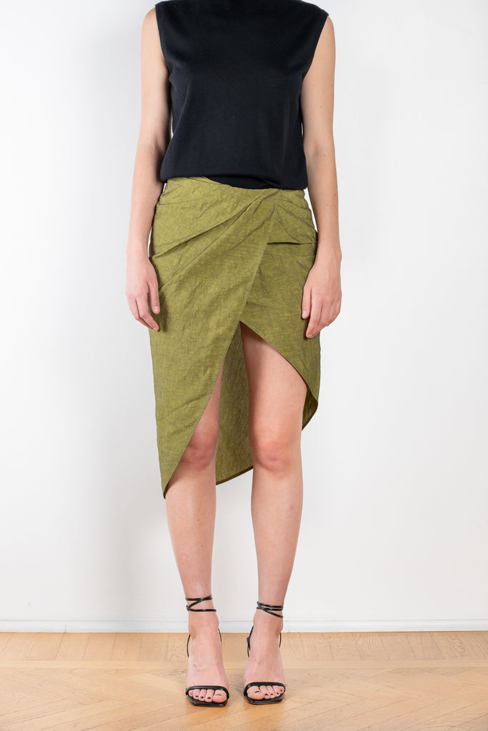 The Paita Midi Weave Skirt is a midi length wrap skirt with a zip closure in a linen blend