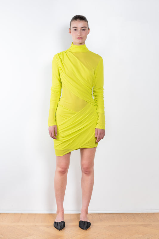 The Ula Dress by Gauge81 is an elegant vibrant yellow dress with draped details in a fine mesh fabric