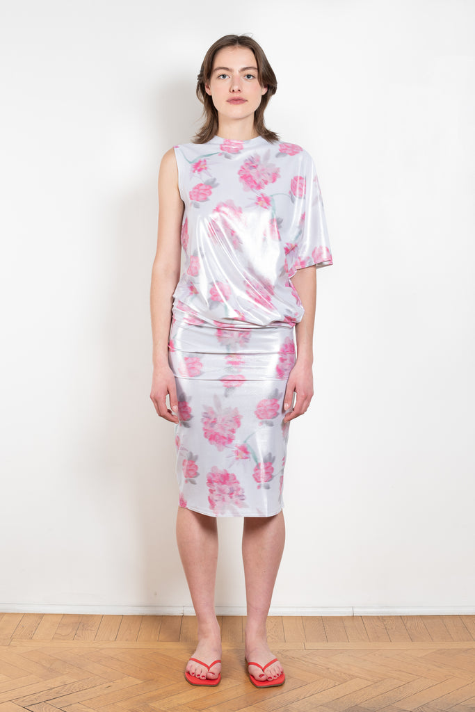 The Didi Slick Dress by Julie Kegels is a one sleeve Glossy dress in a tropical floral print with adjustable length