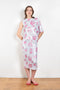 The Didi Slick Dress by Julie Kegels is a one sleeve Glossy dress in a tropical floral print with adjustable length