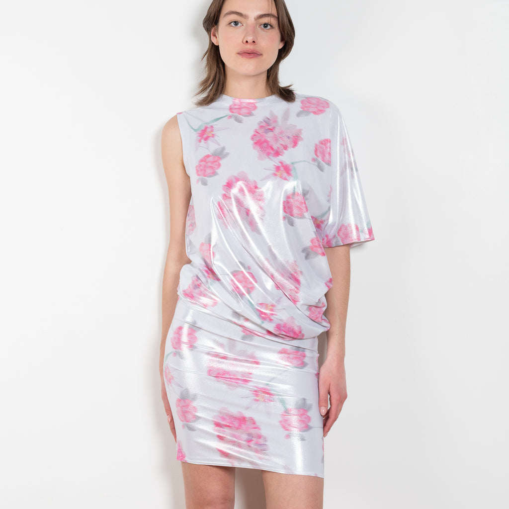 The Didi Slick Dress by Julie Kegels is a one sleeve Glossy dress in a tropical floral print with adjustable length