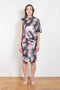 The Didi Slick Dress by Julie Kegels is Glossy dress with tropical flower print with adjustable length