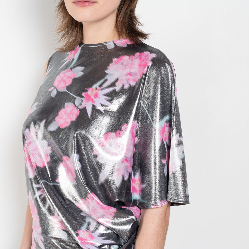 The Didi Slick Dress by Julie Kegels is Glossy dress with tropical flower print with adjustable length