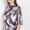 The Didi Slick Dress by Julie Kegels is Glossy dress with tropical flower print with adjustable length