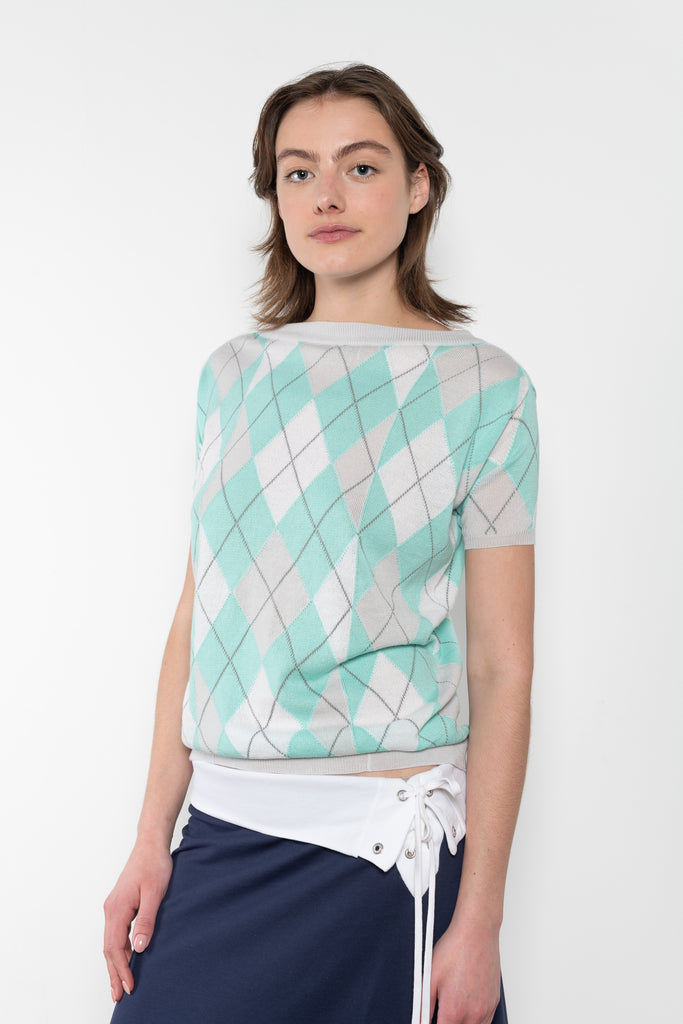 The Jamaica Polo Skirt by Julie Kegels is a maxi skirt in piqué cotton with contrasting waistband