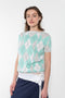 The Jamaica Polo Skirt by Julie Kegels is a maxi skirt in piqué cotton with contrasting waistband