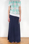 The Jamaica Polo Skirt by Julie Kegels is a maxi skirt in piqué cotton with contrasting waistband