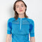 The Kobi Wetsuit Top by Julie Kegels is a knitted top in scuba luxe with zipper in the front