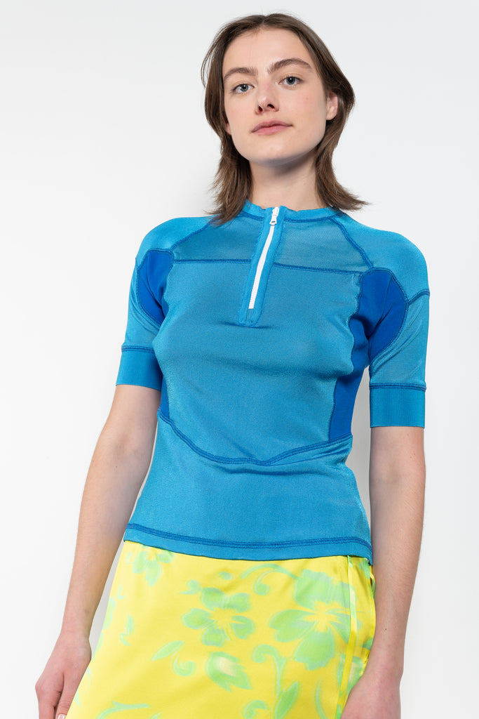 The Kobi Wetsuit Top by Julie Kegels is a knitted top in scuba luxe with zipper in the front