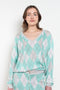 The Kurt Argyle Sweater by Julie Kegels is a fine knit sweater with a tartan pattern