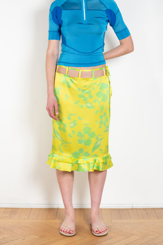 The Sonny Silk Skirt by Julie Kegels is a low waist silk skirt with a cut-out belt loop detail and a floral print