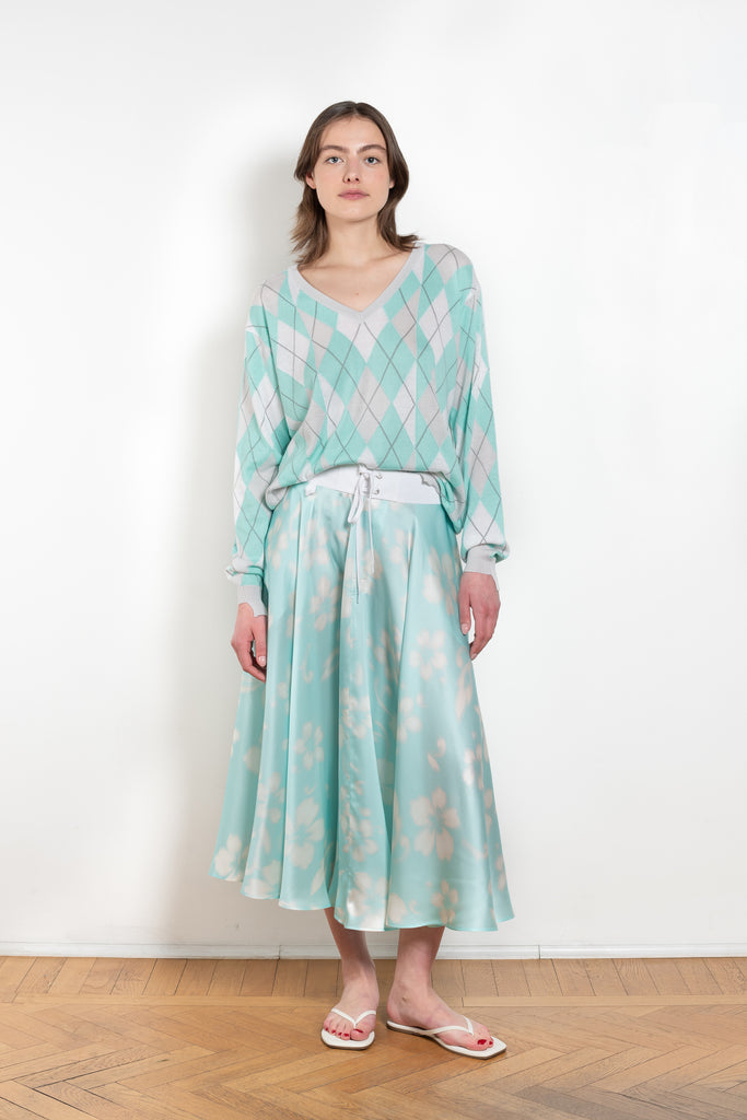 The Susan Circle Skirt by Julie Kegels is a silk midi skirt with contrasting waistband