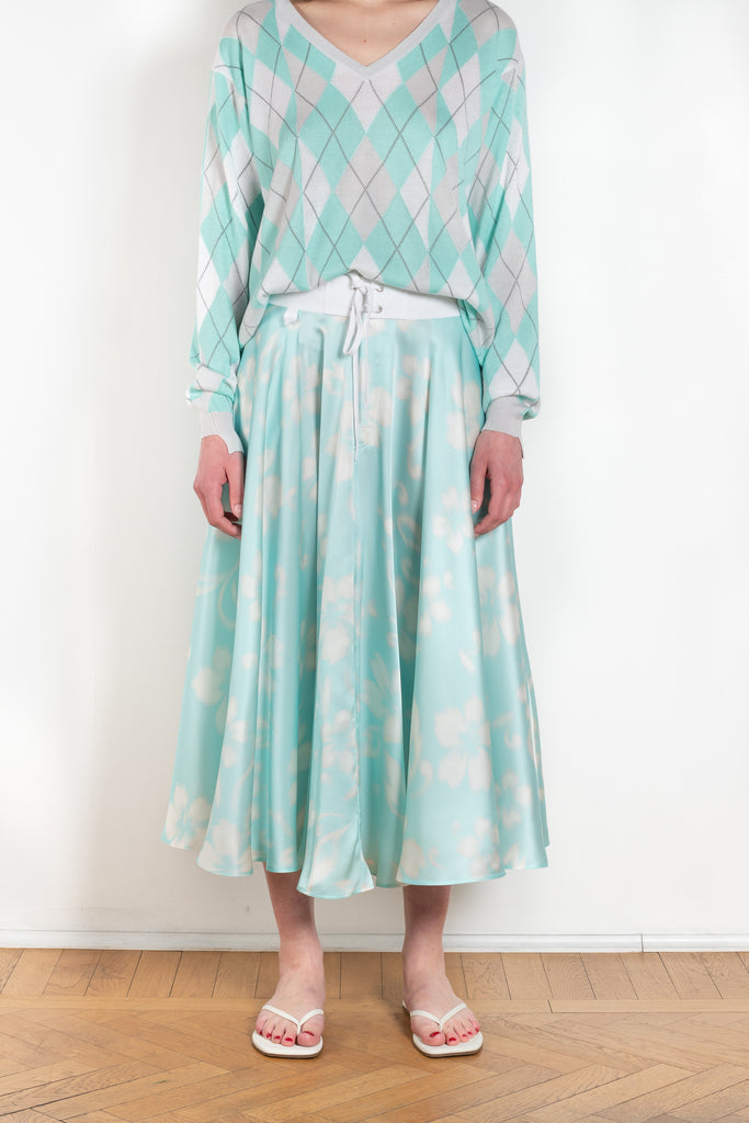 The Susan Circle Skirt by Julie Kegels is a silk midi skirt with contrasting waistband