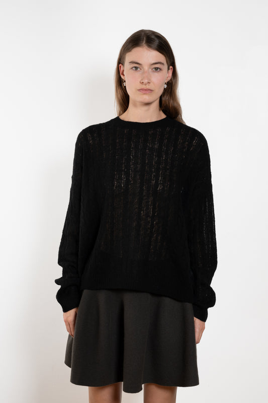 The Amabel Sweater by Lisa Yang is crafted in featherlight silk cashmere with a sheer, airy hand.