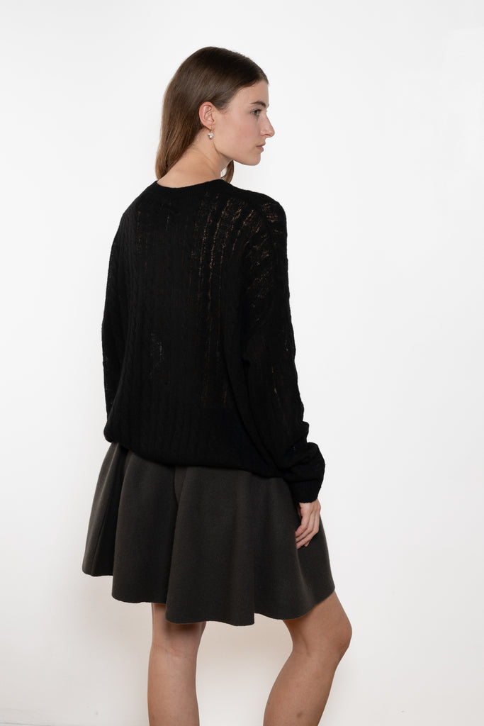The Amabel Sweater by Lisa Yang is crafted in featherlight silk cashmere with a sheer, airy hand.