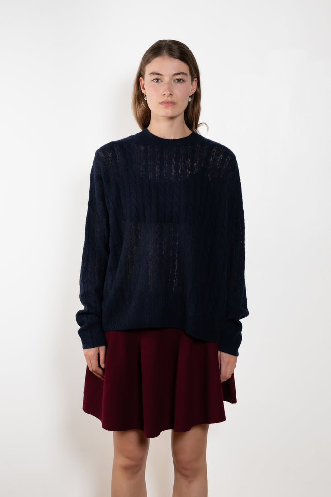 The Amabel Sweater by Lisa Yang is crafted in featherlight silk cashmere with a sheer, airy hand.