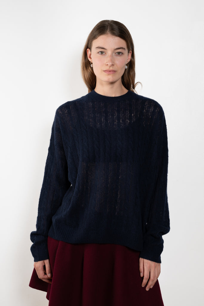The Amabel Sweater by Lisa Yang is crafted in featherlight silk cashmere with a sheer, airy hand.