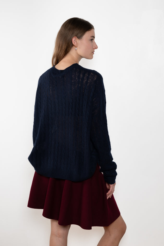 The Amabel Sweater by Lisa Yang is crafted in featherlight silk cashmere with a sheer, airy hand.