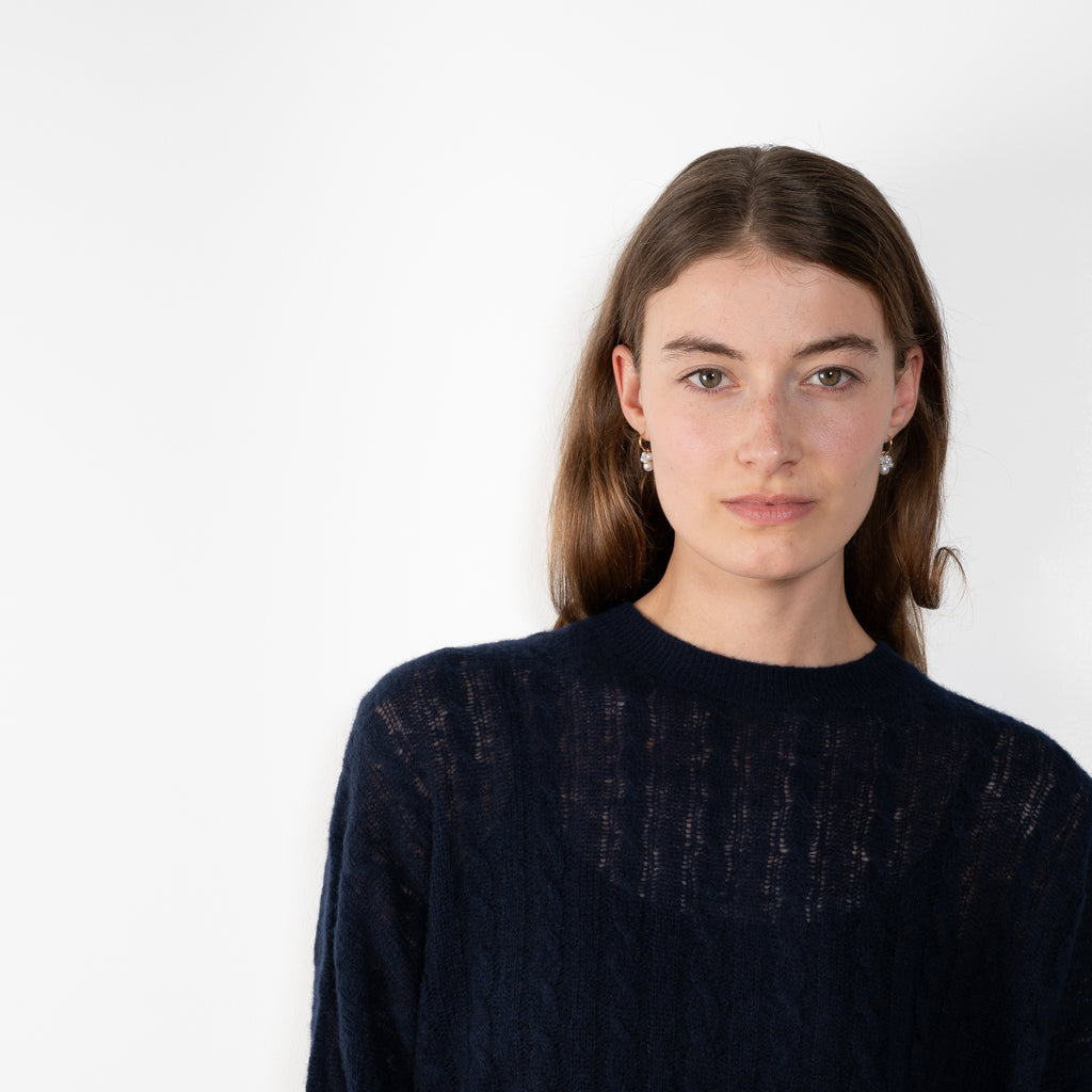 The Amabel Sweater by Lisa Yang is crafted in featherlight silk cashmere with a sheer, airy hand.