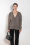 The Amery Cardigan by Lisa Yang is heavy knit cardigan with a longer fit, a deep V neck dropped shoulders and a accentuated rib detail at the hem