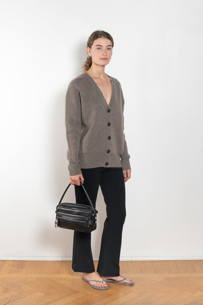 The Amery Cardigan by Lisa Yang is heavy knit cardigan with a longer fit, a deep V neck dropped shoulders and a accentuated rib detail at the hem