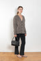 The Amery Cardigan by Lisa Yang is heavy knit cardigan with a longer fit, a deep V neck dropped shoulders and a accentuated rib detail at the hem