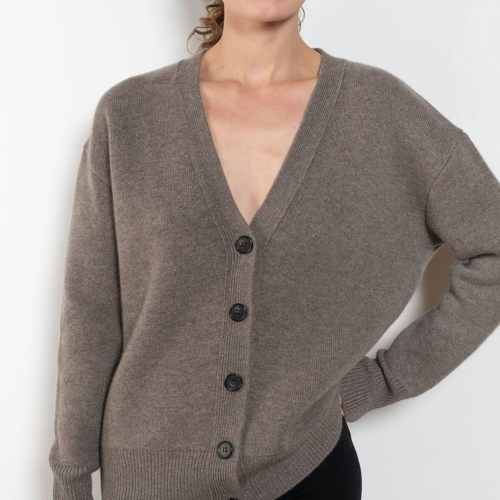 The Amery Cardigan by Lisa Yang is heavy knit cardigan with a longer fit, a deep V neck dropped shoulders and a accentuated rib detail at the hem