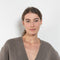 The Amery Cardigan by Lisa Yang is heavy knit cardigan with a longer fit, a deep V neck dropped shoulders and a accentuated rib detail at the hem