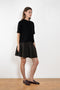 The Cila Tee by LISA YANG is a fine knit cashmere t-shirt with a classic round neck and rolled trim edges