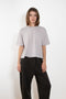 The Cila Tee by LISA YANG is a fine knit cashmere t-shirt with a classic round neck and rolled trim edges