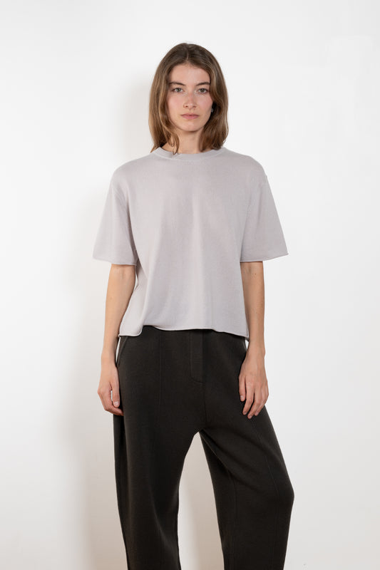 The Cila Tee by LISA YANG is a fine knit cashmere t-shirt with a classic round neck and rolled trim edges