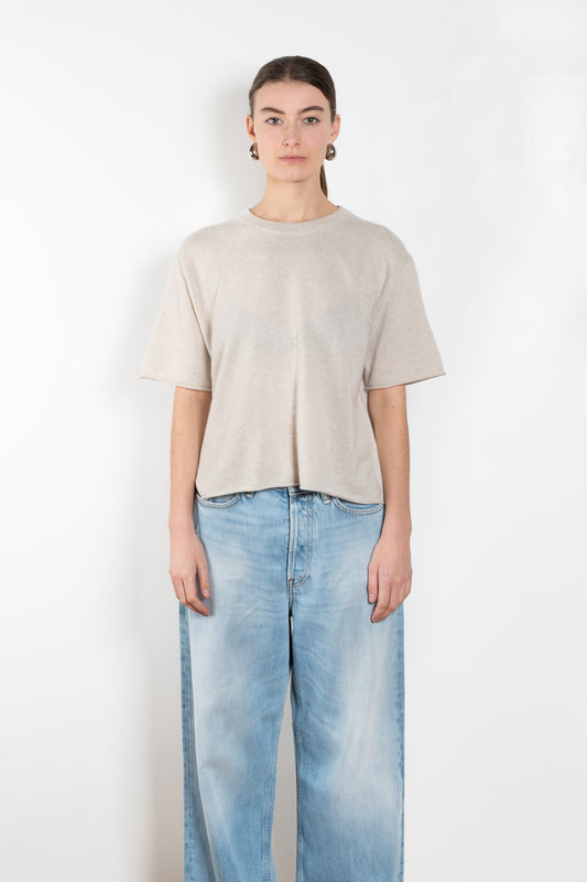 The Cila Tee by LISA YANG is a fine knit cashmere t-shirt with a classic round neck and rolled trim edges