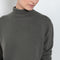 The Clio Sweater by Lisa Yang is a fine cashmere knit with a loose fit and high neck