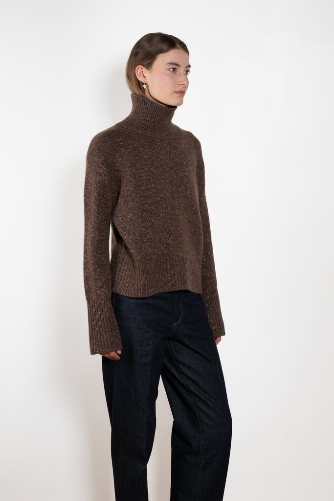 The Femi Sweater by LISA YANG is a timeless wardrobe essential, expertly crafted from 100% premium cashmere for exceptional softness and warmth