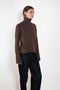 The Femi Sweater by LISA YANG is a timeless wardrobe essential, expertly crafted from 100% premium cashmere for exceptional softness and warmth
