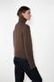 The Femi Sweater by LISA YANG is a timeless wardrobe essential, expertly crafted from 100% premium cashmere for exceptional softness and warmth