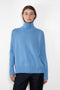 The Heidi Sweater by Lisa Yang&nbsp;is crafted in rich, heavy knit cashmere. The cocooning silhouette is made more inviting by an enveloping high neck, dropped shoulders, full-length sleeves