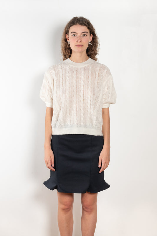 The Kenzie Sweater by Lisa Yang is a softly voluminous cable knit top in a delicate silk cashmere blend.